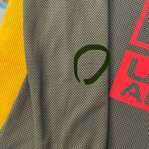 Boys under armour  long sleeve shirt Size Ylg. Grey/black red print